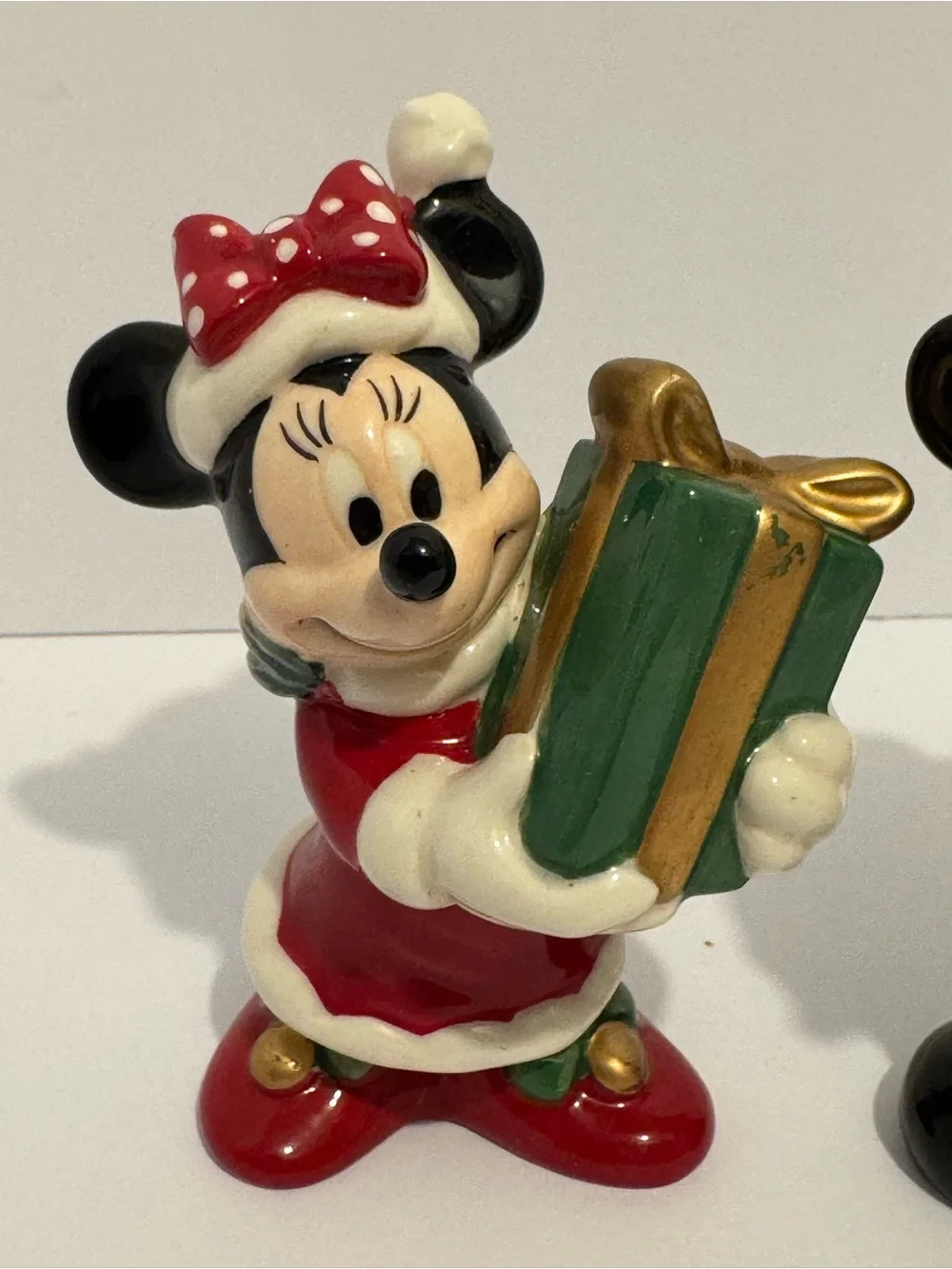 Disney Mickey and Minnie Mouse Christmas ceramic salt and pepper shaker set.
